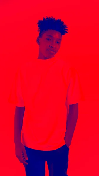 Duotone or half tone portrait of young african american man in studio — Stock Photo, Image