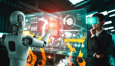 Mekanize endüstri robotu ve insan işçileri gelecekteki fabrikada birlikte çalışıyorlar.