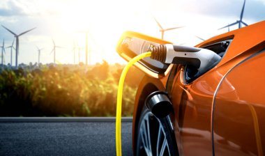 Yeşil sürdürülebilir enerji kavramında elektrikli araba için EV şarj istasyonu