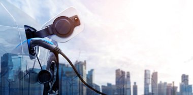 Yeşil enerji ve ekolojik güç kavramında elektrikli araba şarj istasyonu