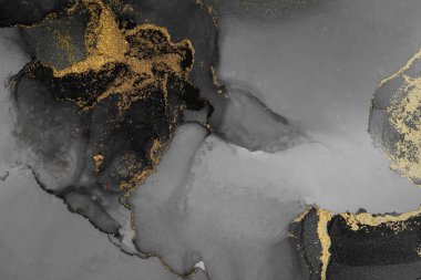 Kağıt üzerinde mermer sıvı mürekkep resminin koyu altın soyut arkaplanı .