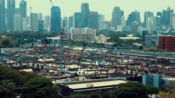 Panoramic view of cityscape and construction site in metropolis — Stock Video