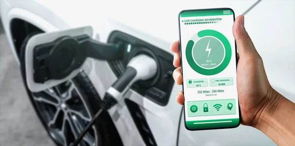 EV charging station for electric car with mobile app display charger status — Stock Photo, Image