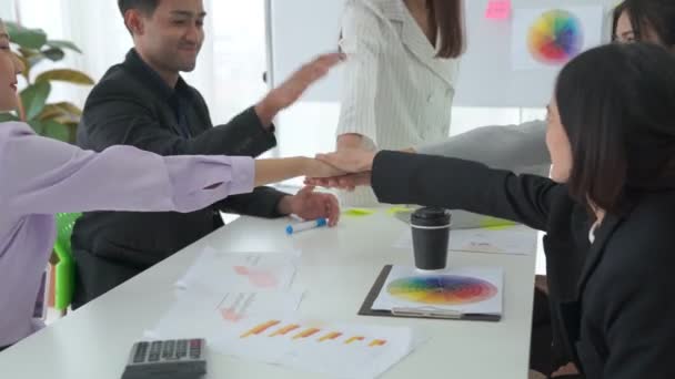 Business people proficiently celebrate project success at office workplace — Stock Video