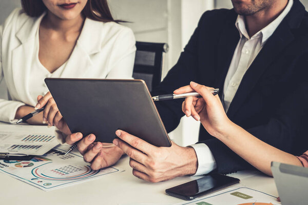 Businessman and businesswomen working in office.