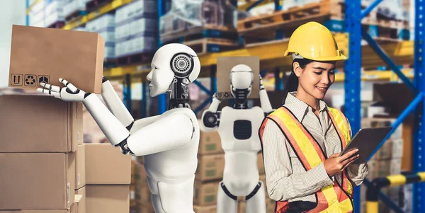 Innovative industry robot working in warehouse together with human worker — Stock Photo, Image