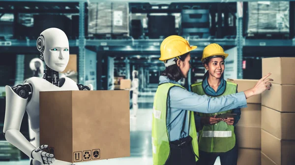 Innovative industry robot working in warehouse together with human worker — Stock Photo, Image