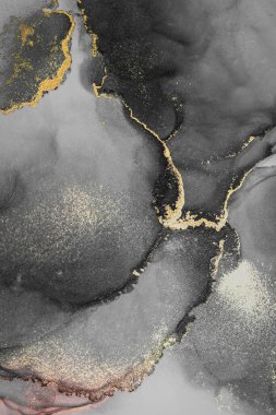 Kağıt üzerinde mermer sıvı mürekkep resminin koyu altın soyut arkaplanı .