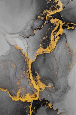 Kağıt üzerinde mermer sıvı mürekkep resminin koyu altın soyut arkaplanı .