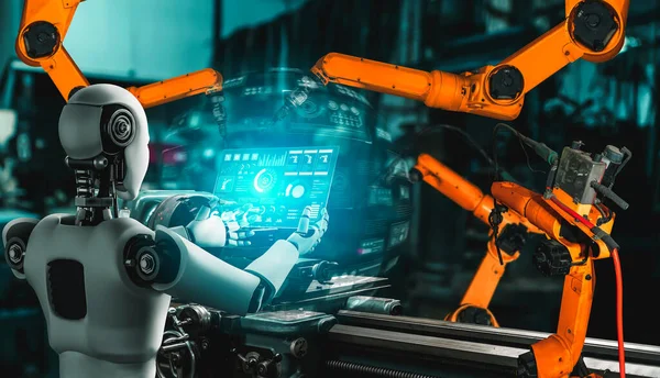 Mechanized industry robot and robotic arms for assembly in factory production .