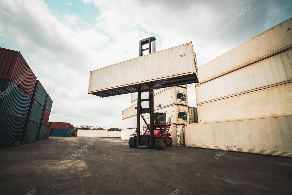 Cargo container for overseas shipping in shipyard with heavy machine .