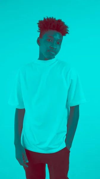 Duotone or half tone portrait of young african american man in studio — Stock Photo, Image