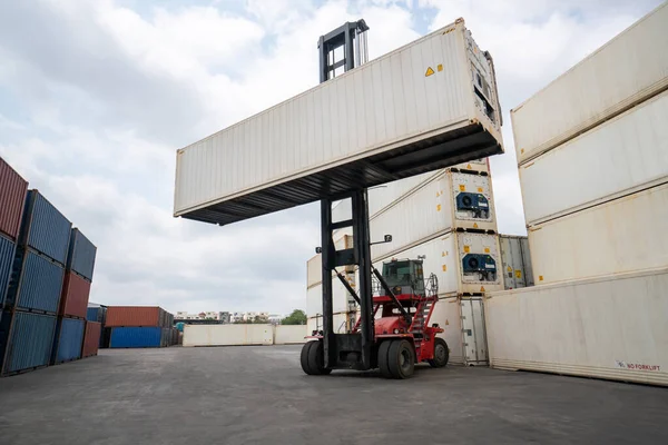 Cargo container for overseas shipping in shipyard with heavy machine .