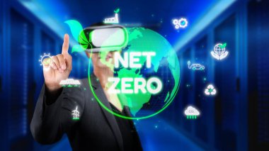 A business professional uses virtual reality to engage with innovative solutions targeting net zero carbon emissions and advancing sustainable energy practices for a better future. XDMCP