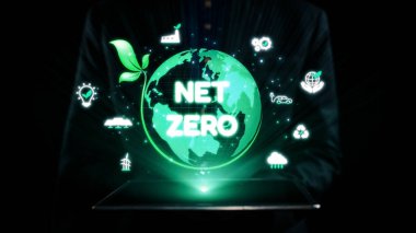 Modern görsel sürdürülebilirliğe bağlılığı sembolize ediyor, net sıfır vurgu ile yeşil bir küre sergiliyor, dengeli ve çevre dostu bir gelecek için çabayı temsil ediyor. Dörtgen