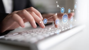 A close-up of a business professional hands typing on a keyboard, surrounded by digital icons representing data and connections, showcasing modern technology and innovation. Tessel