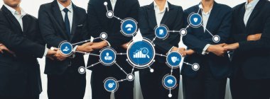 A professional team engages in collaboration with visual metrics and connection icons, illustrating effective management strategies and the importance of teamwork for success. Amity