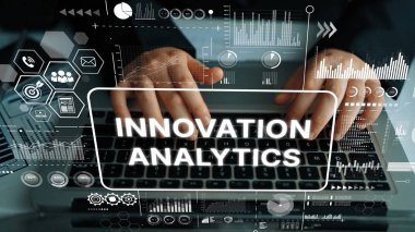Hands Typing on Laptop with Innovation Analytics Data Visualization and Graphs in a Modern Office Environment. Asymptotic smart data analytic.