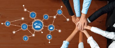 This image represents collaboration and innovation in business, showcasing diverse hands united to symbolize teamwork and the pursuit of success in corporate environments. Amity