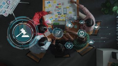 A diverse team engaged in a collaborative meeting, using modern technology to discuss legal strategies and brainstorm innovative ideas in a contemporary office setting. Raster