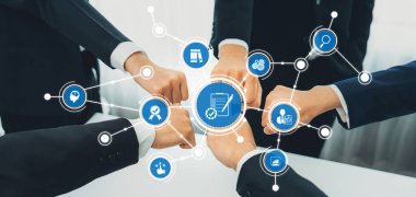 A powerful representation of teamwork and collaboration among professionals showcasing hands joined together amidst digital icons symbolizing connectivity and innovation. Amity