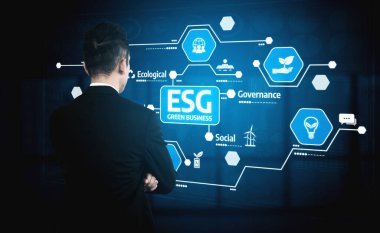A business professional examines key components of ESG principles, highlighting the importance of sustainability in corporate governance and responsible practices for future success. Tessel