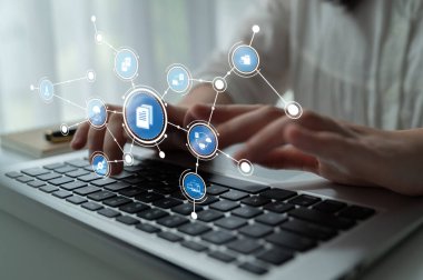 A creative visual showing hands typing on a laptop with circular icons connecting various concepts, symbolizing digital connectivity and technology engagement. Tessel