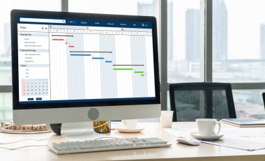 Ekip projesinin zaman çizelgesini gösteren bilgisayar ekranında, modern iş projesi yönetimi için proje planlama yazılımı