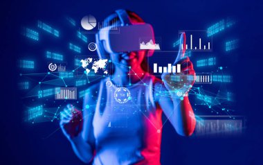 Bir kadın sanal gerçeklik teknolojisiyle etkileşime geçerek büyük veri görselleştirmelerini, finansal sezgileri ve yenilikçi analitikleri canlı bir dijital ortamda sergiliyor. XDMCP