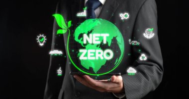 Sürdürülebilirlik simgeleriyle çevrili dijital küre, karbon emisyonlarını azaltma ve çevresel dengeyi sağlama amacını temsil etmektedir