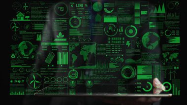 Bir dizüstü bilgisayar ekranında yeşil enerji istatistiklerinin parlak bir görselleştirmesini keşfedin, sürdürülebilir enerji yönetimi ve analizi için anahtar ölçüler ve simgeler gösterin. Şifreleme