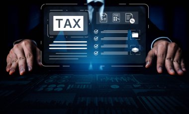 Vergi hazırlama ve mali uyum kavramı. Devlet raporlama, denetleme ve mali muhasebe amacıyla resmi vergi belgeleri ve formları dolduruluyor. Fermion