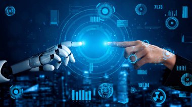 Fütürist grafikler ve verilerle dolu dijital bir arkaplan karşısında, insan ve robot eller arasındaki bağlantıyı gösteren çarpıcı bir görüntü. Xenic