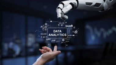 Bir robot el insan eline doğru uzanır ve günümüz teknolojik ortamındaki yapay zeka ve veri analizlerinin sinerjisini sembolize eder. Sinaps