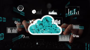 Bu resim görsel veri analiziyle bulut hesaplama kavramını gösteriyor. Sergide, bilgilendirilmiş iş kararları ve stratejileri için analitik araçlar ve grafikler yer alıyor. Xenic