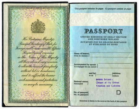 Old British passport isolated on white background