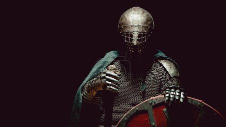 Caballero medieval en armadura con espada y escudo
. Caballero medieval en armadura con espada y escudo
.