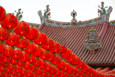 Photo for Chinese New Year red and yellow paper lanterns in Kuan Yin Temple, Penang, Malaysia - Royalty Free Image