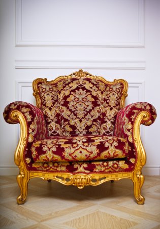 Photo for Luxurious vintage red and gold armchair - Royalty Free Image