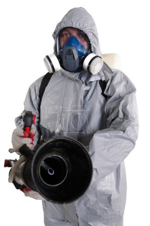 Photo for A pest control worker wearing a mask, hood, protective suit and dual air filters holding a hose to help exterminate rats and other vermin. - Royalty Free Image