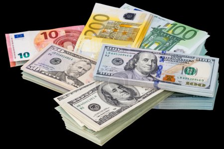 Paquetes de dólares y euros en un negro
Paquetes de dólares y euros en un negro