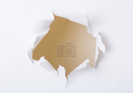 Photo for Hole on white paper sheet - Royalty Free Image