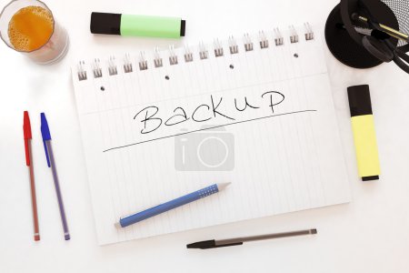 Photo for Backup - handwritten text in a notebook on a desk - 3d render illustration. - Royalty Free Image
