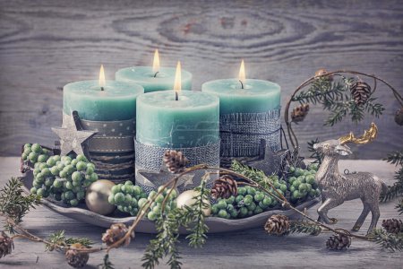 Vela de Navidad verde cuatro
