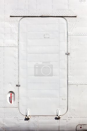 Photo for Old white painted aircraft fuselage close up. - Royalty Free Image