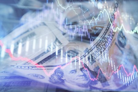 Double exposure of forex graph drawing over us dollars bill background. Concept of financial markets.