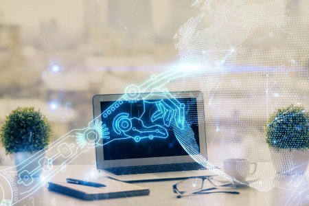 Photo for Computer on desktop in office with technology theme hologram. Double exposure. Tech concept. - Royalty Free Image