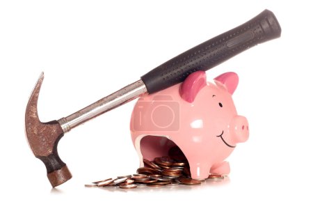 Photo for Breaking into your piggybank studio cutout - Royalty Free Image