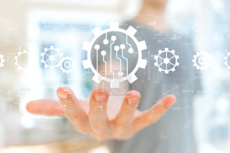 Photo for Automation concept with young man holding his hand - Royalty Free Image