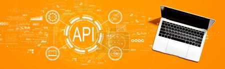 Photo for API - application programming interface concept with a laptop computer on a desk - Royalty Free Image